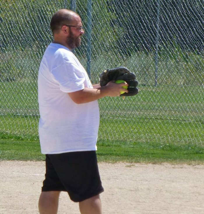 Coach Mike Kay seen here pitching in the bats for a cause wood bat tournament